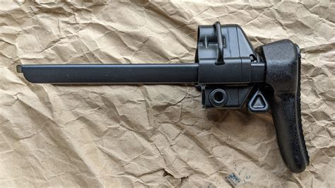 Solid steel housing, hinge pin, and folding arm. . Mke mp5 collapsible stock